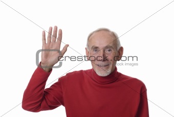 Senior man waving on white