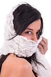 beautiful woman covering her face with a white handkerchief, isoated on white, studio shot