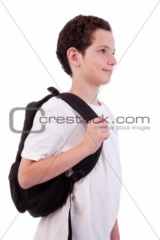 schoolboy holding backpack, isolated on white, studio shot