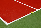 Corner of the tennis court with ball