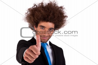 Portrait of a happy and young  business man, with thumb up isolated on white background. Studio shot.