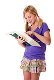 Happy school girl reading and learning