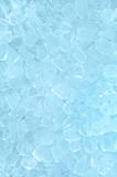 fresh cool ice cube background in blue light