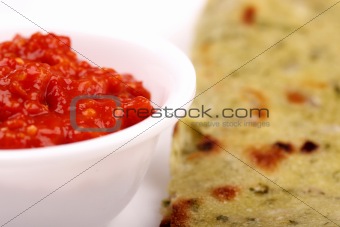 Spicy chili chutney with indian bread