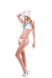 young girl in bikini with summer hat