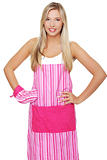 Beautiful happy young blond woman wearing kitchen apron