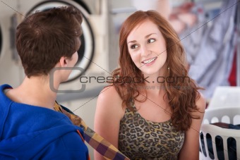 Smiling Woman In Laundromat
