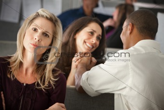 Woman Envying Coworkers