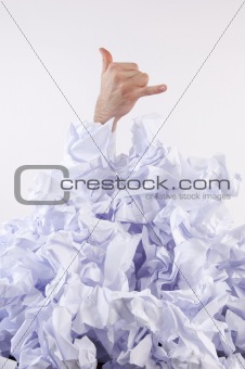 Businessman overwhelmed by paper