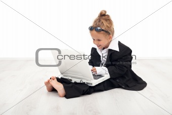 Little girl playing career woman role