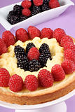 Custard tart with raspberries and blackberries