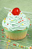 Cupcake with candied cherry