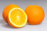 three ripe oranges 