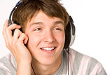 Teenage Boy Listening To Music On Headphones