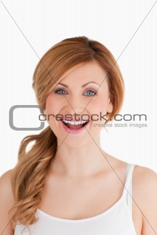 Happy young woman looking at the camera