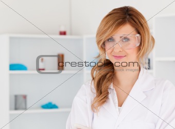 Attractive blond-haired scientist posing