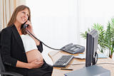 Beautiful pregnant woman on the phone