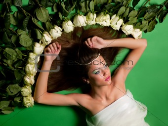 girl  among the flowers of roses