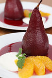 Poached pears in red wine with oranges and creme fraiche