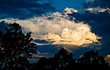 stormy sky cloudscape with storm clouds silhouette and sunlight