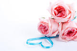 Bouquet of roses with ribbon in heart shape