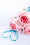 Bouquet of roses with ribbon in heart shape