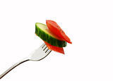 slice of red pepper and cucumber on the fork