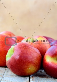 Fresh ripe red peaches on a wooden table