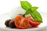 Tomato Mozzarella appetizer on white isolated background