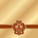 gold background with a red Victorian pattern