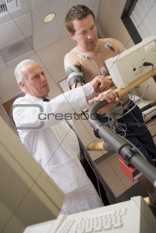Doctor Monitoring Patient During Health Check