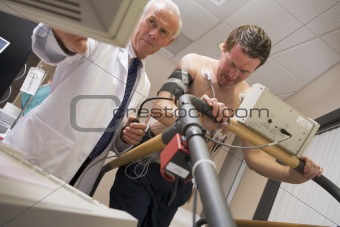 Doctor Monitoring Patient During Health Check