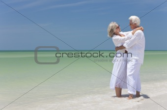 Happy Senior Couple Embracing on A Tropical Beach