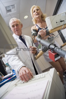 Doctor With Patient During Health Check