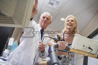 Doctor With Patient During Health Check