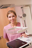 Nurse With Mammogram Machine
