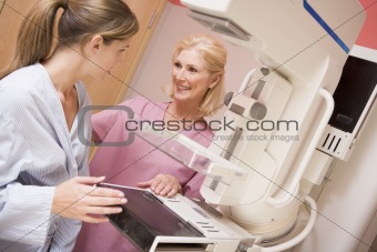 Nurse With Patient About To Have A Mammogram