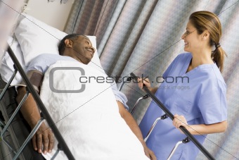 Nurse Caring For Patient