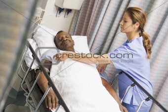 Nurse Caring For Patient