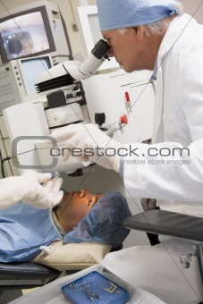Doctor Checking Patient's Eyes