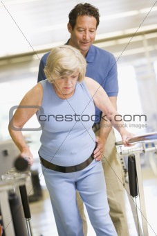 Physiotherapist With Patient In Rehabilitation
