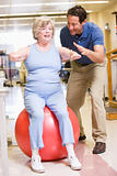 Physiotherapist With Patient In Rehabilitation