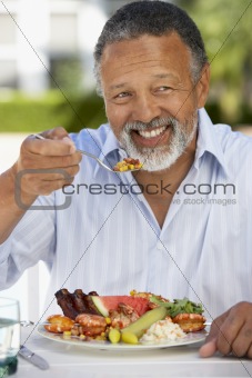 Middle Aged Man Dining Al Fresco