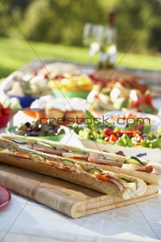 Al Fresco Dining, With Food Laid Out On Table