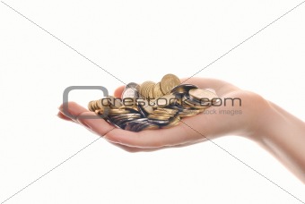 heap of coins in woman hand