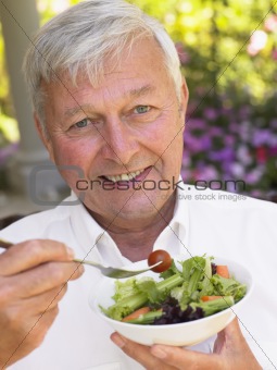 Senior Man Eating Fresh Salad