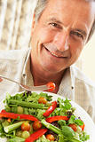 Senior Man Eating A Healthy Salad