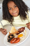 Young Girl Eating Unhealthy Breakfast