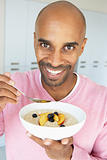 Middle Aged Man Eating Healthy Breakfast
