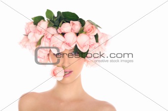young woman in hat of roses